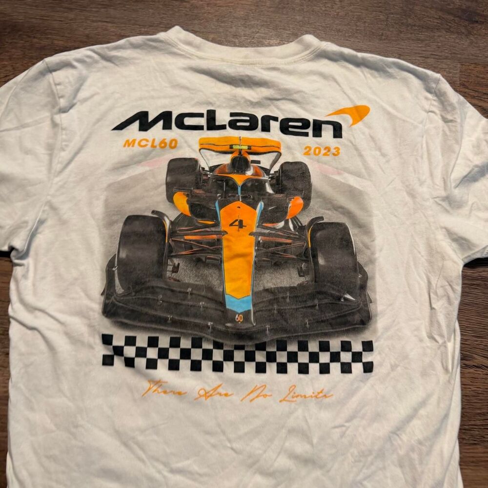 McLaren F1 2023 white t-shirt with orange/black race car graphic and checkered f - Picture 3 of 6